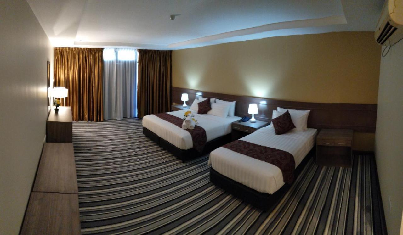 Temu Primula Hotel Kampong Seberang Timor Exterior foto