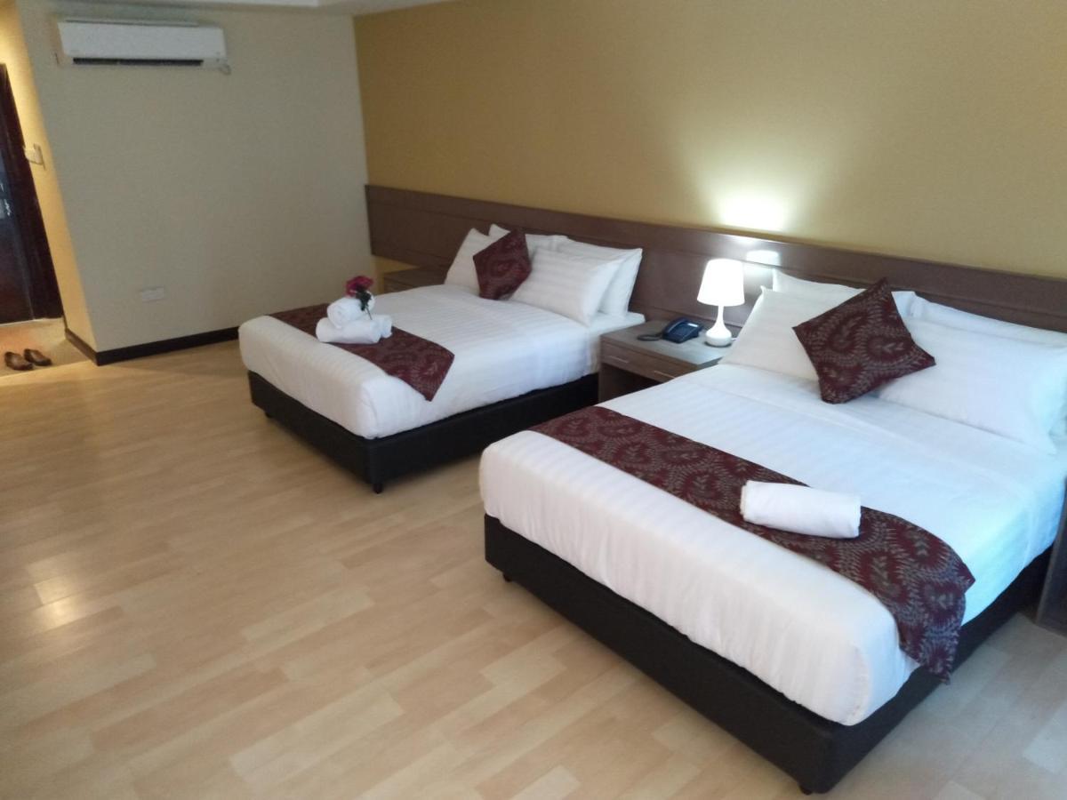 Temu Primula Hotel Kampong Seberang Timor Exterior foto